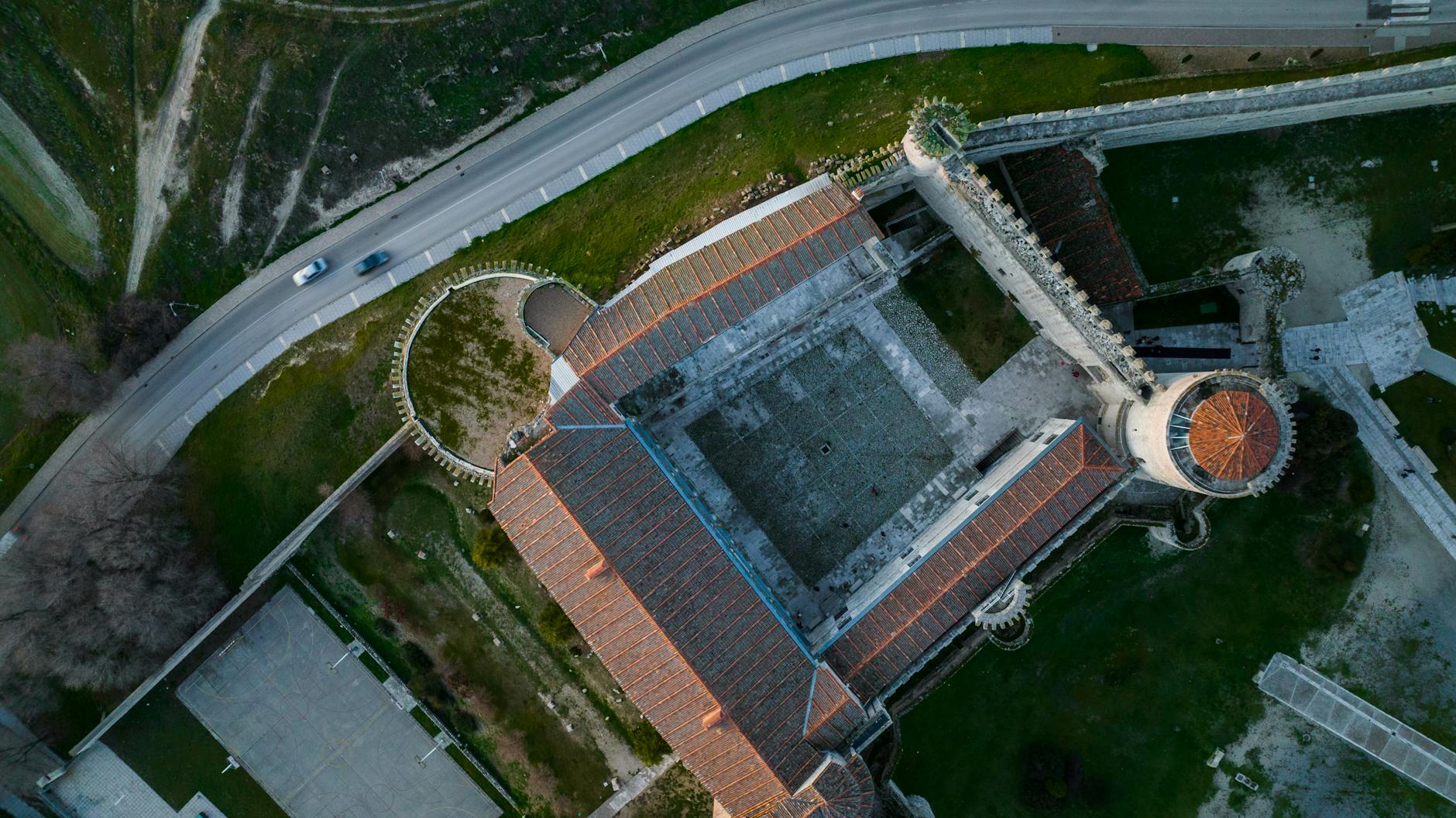 Breathtaking aerial shot of the ancient Cuéllar Castle in Castilla y León, Spain.