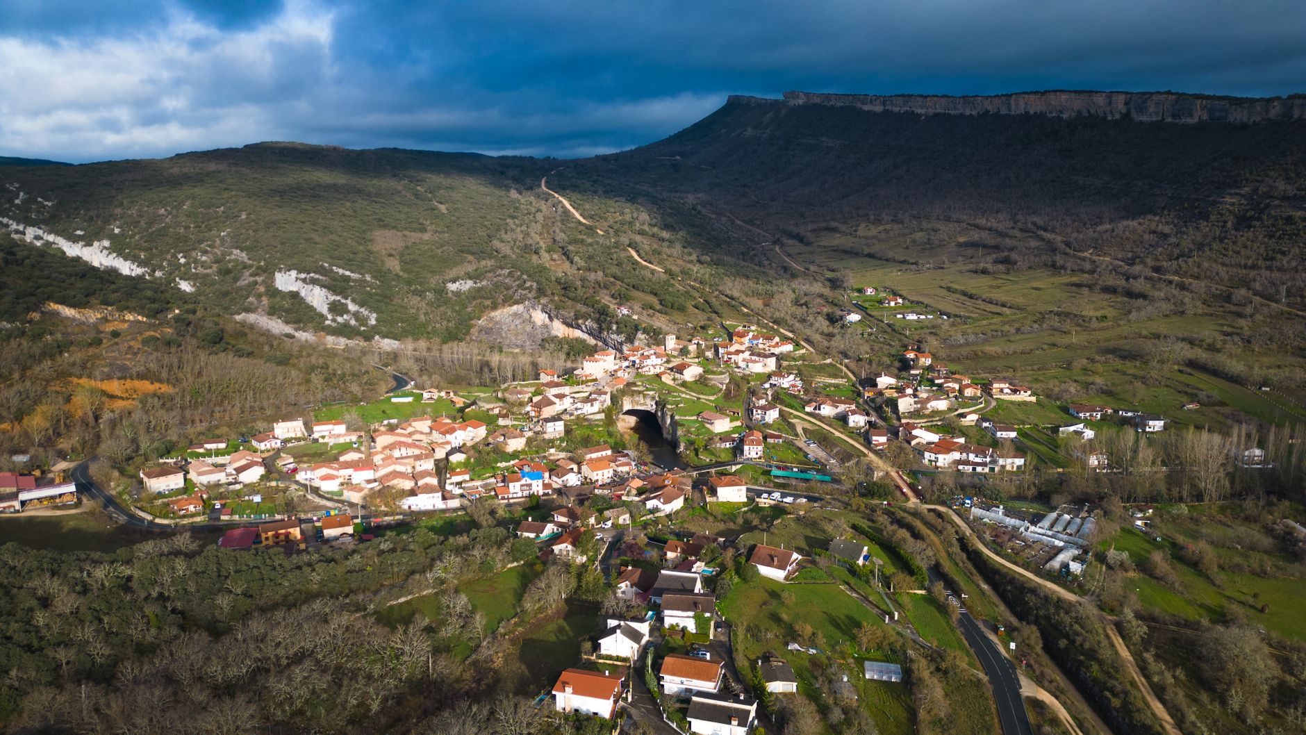 Stunning aerial view of Puentedey village nestled in natural landscape, Burgos, Spain.